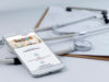 Mobile phone, stethoscope and chart file on the desktop (mobile medical, handheld doctor concepts)